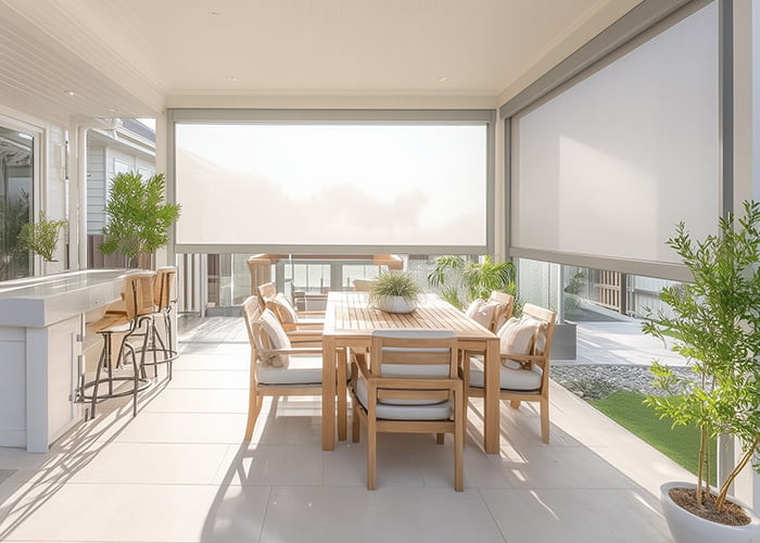 Retractable outdoor blinds installed on a patio area